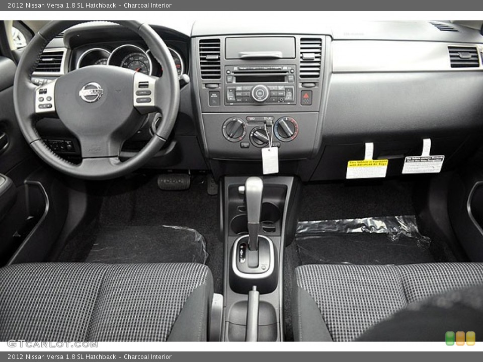 Charcoal Interior Dashboard for the 2012 Nissan Versa 1.8 SL Hatchback #71634845