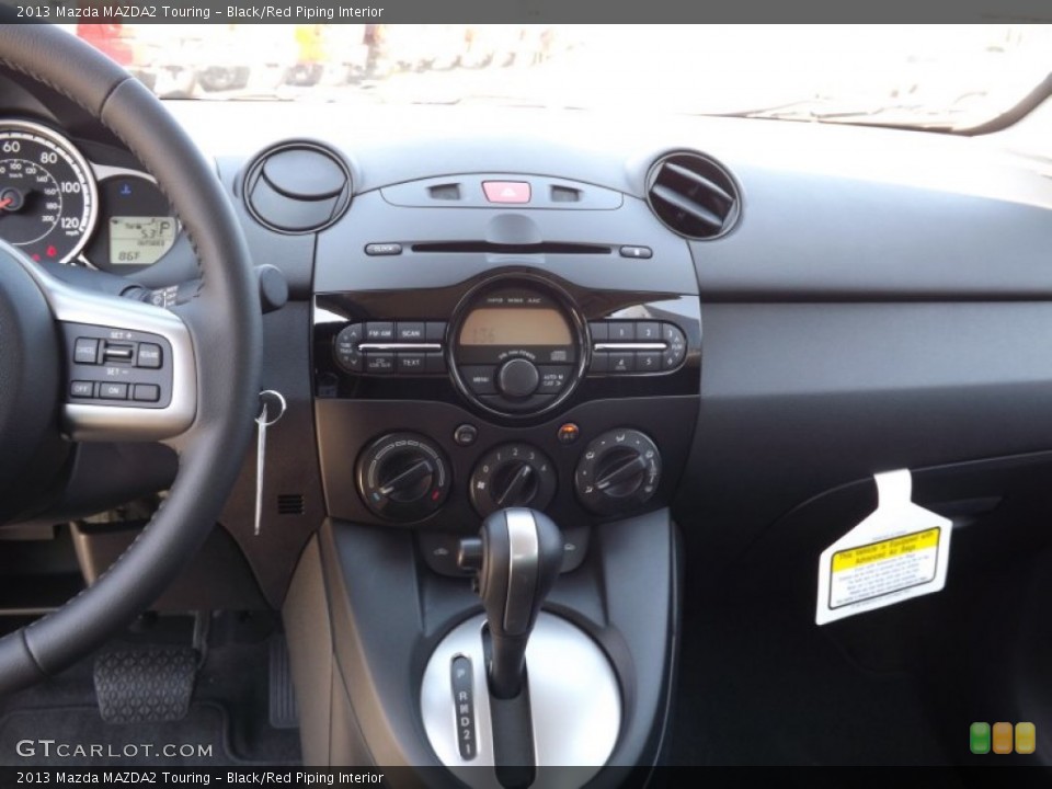 Black/Red Piping Interior Controls for the 2013 Mazda MAZDA2 Touring #71637622