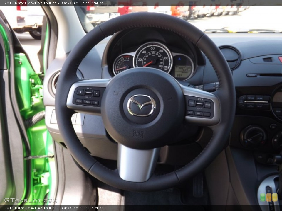 Black/Red Piping Interior Steering Wheel for the 2013 Mazda MAZDA2 Touring #71637631