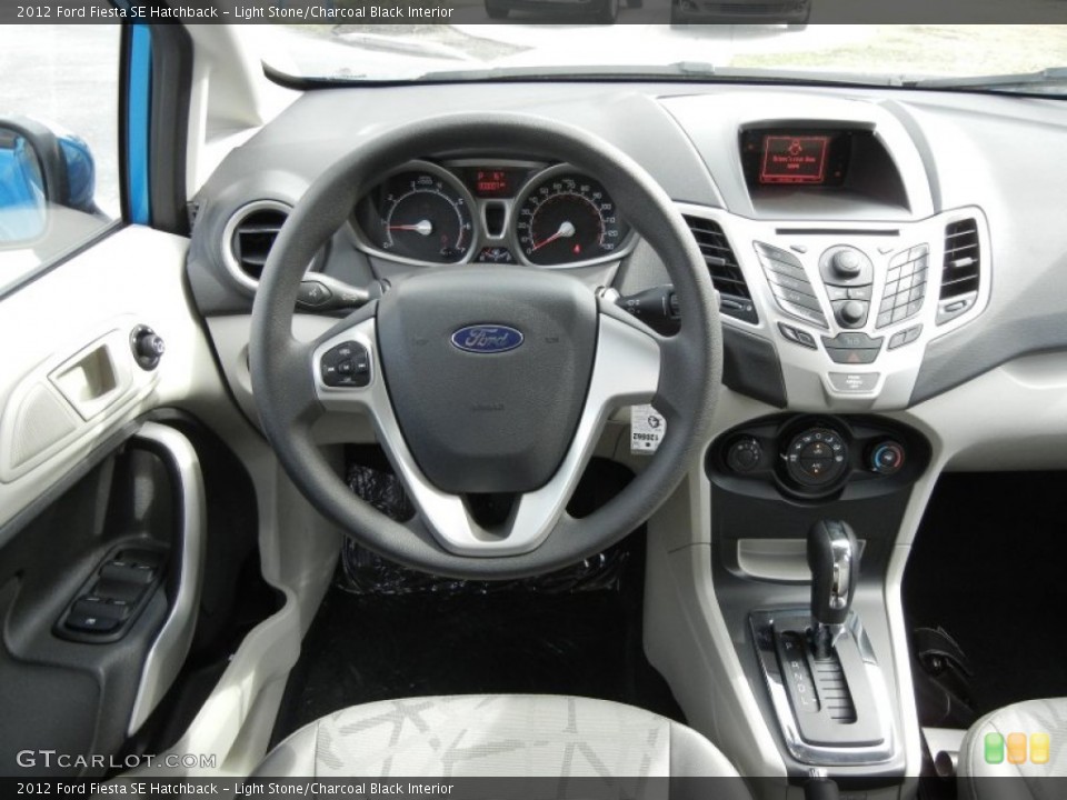 Light Stone/Charcoal Black Interior Dashboard for the 2012 Ford Fiesta SE Hatchback #71647672