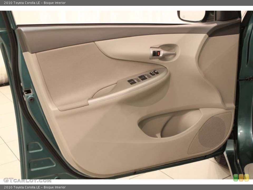 Bisque Interior Door Panel for the 2010 Toyota Corolla LE #71679376