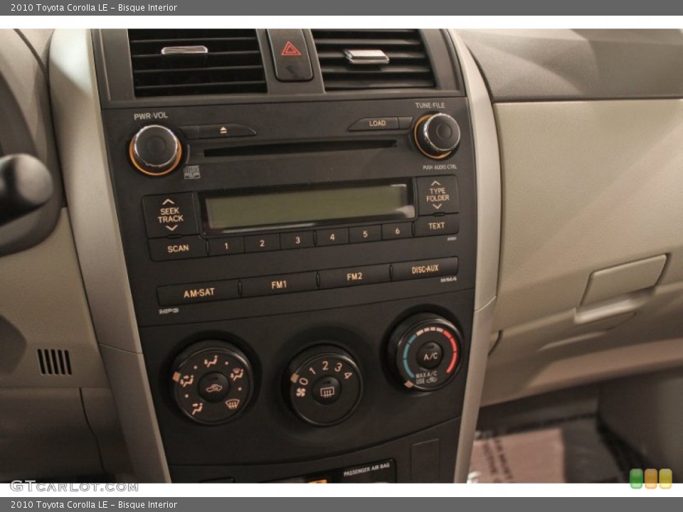 Bisque Interior Controls for the 2010 Toyota Corolla LE #71679409