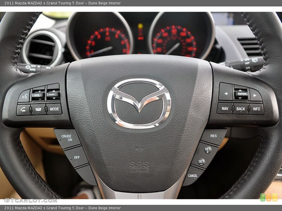 Dune Beige Interior Steering Wheel for the 2011 Mazda MAZDA3 s Grand Touring 5 Door #71689743