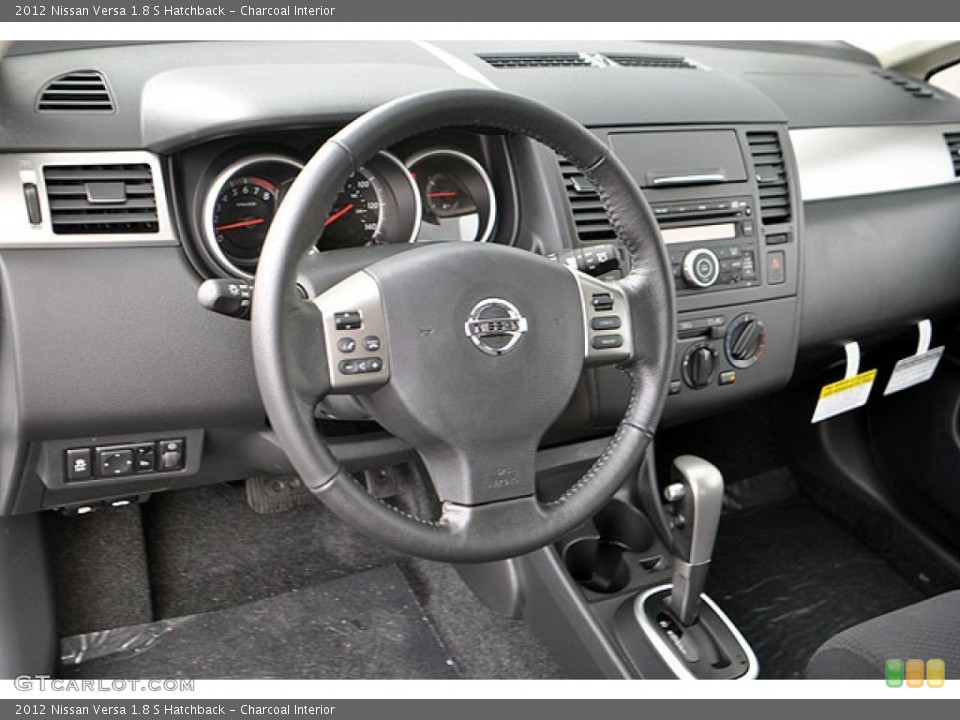 Charcoal Interior Dashboard for the 2012 Nissan Versa 1.8 S Hatchback #71689969