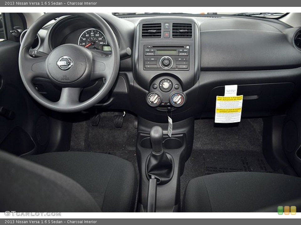 Charcoal Interior Dashboard for the 2013 Nissan Versa 1.6 S Sedan #71690155