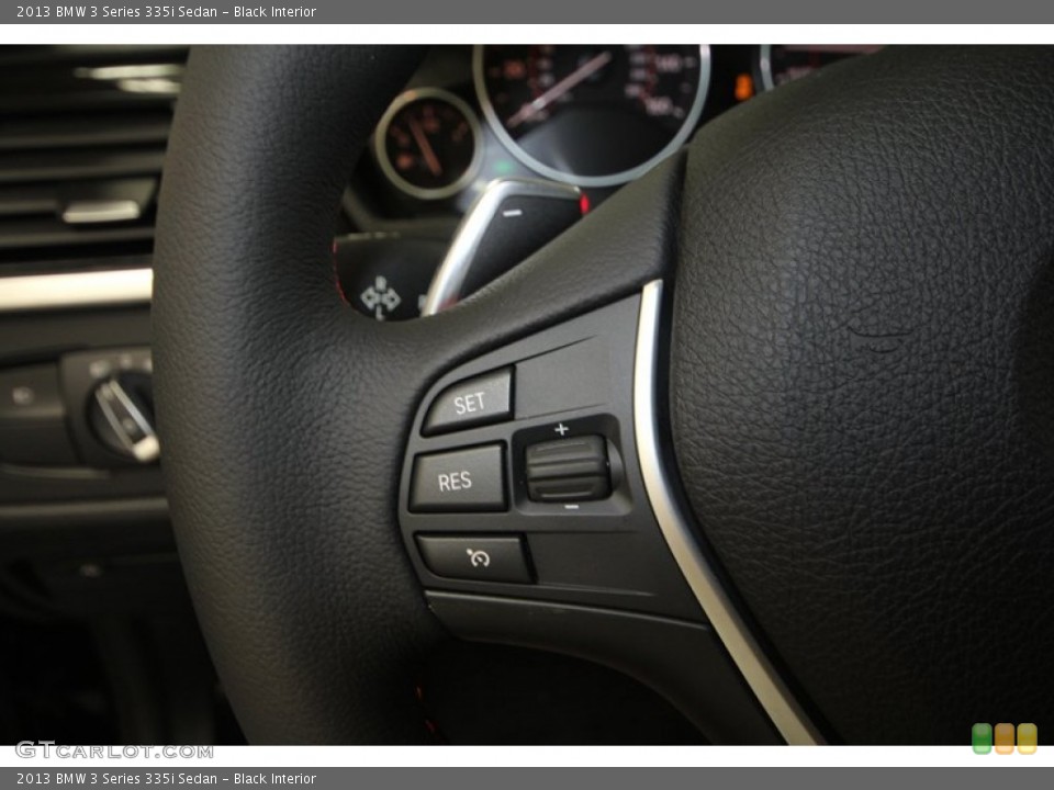 Black Interior Controls for the 2013 BMW 3 Series 335i Sedan #71692405