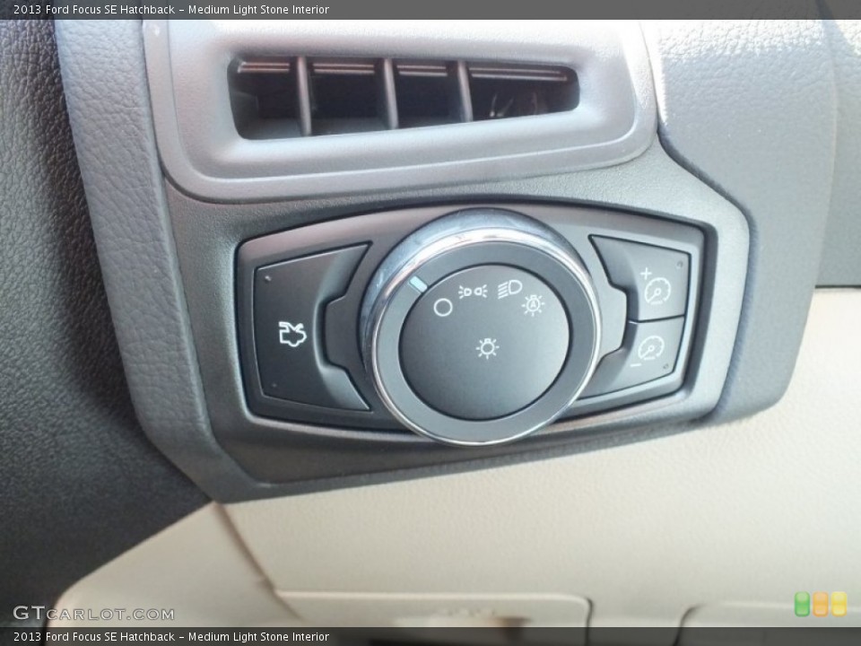 Medium Light Stone Interior Controls for the 2013 Ford Focus SE Hatchback #71697070