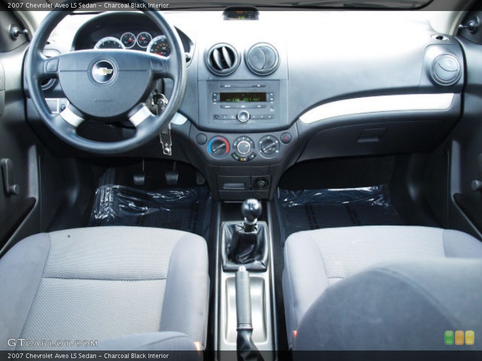 Charcoal Black Interior Dashboard for the 2007 Chevrolet Aveo LS Sedan #71721676