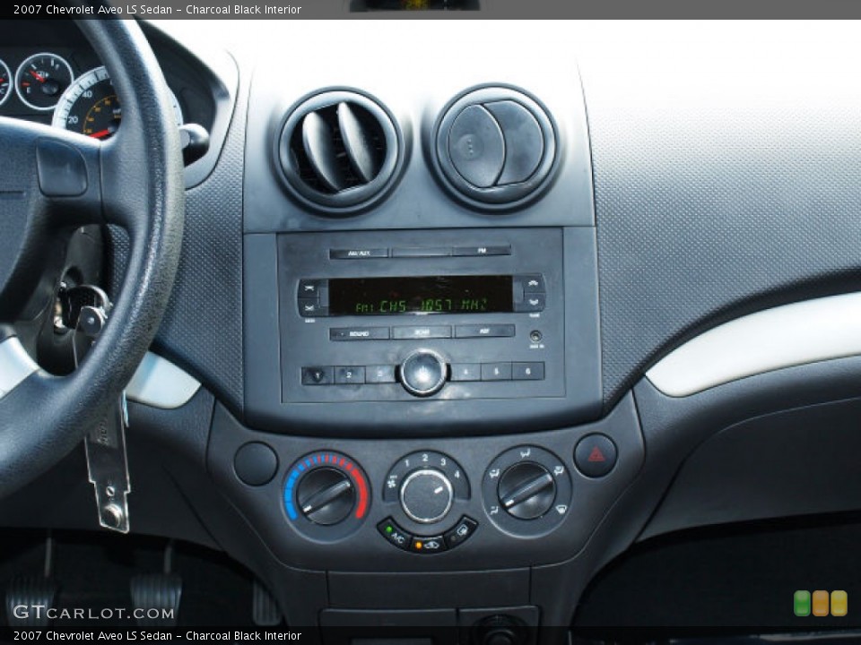 Charcoal Black Interior Controls for the 2007 Chevrolet Aveo LS Sedan #71721691
