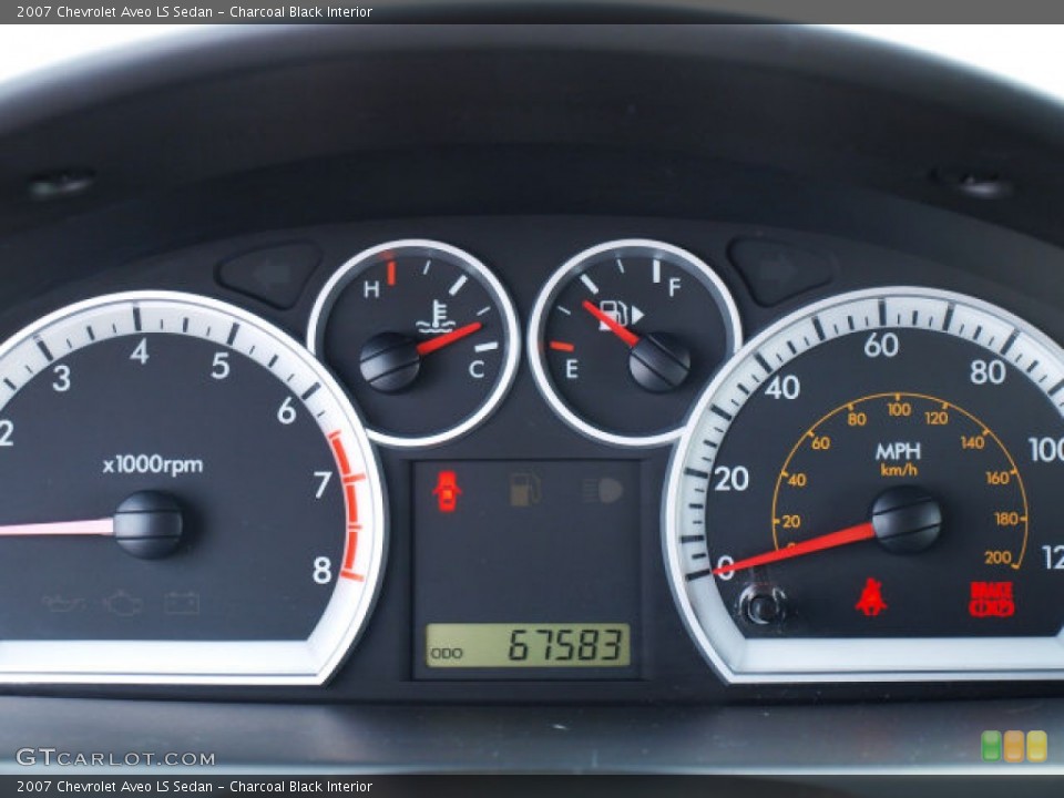 Charcoal Black Interior Gauges for the 2007 Chevrolet Aveo LS Sedan #71721715