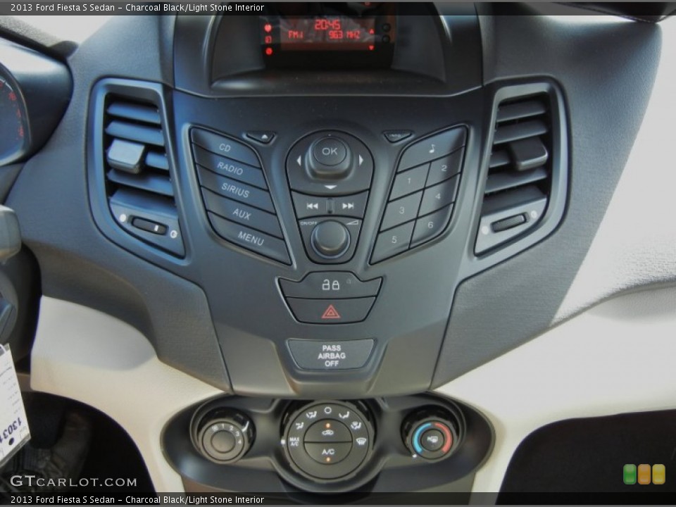 Charcoal Black/Light Stone Interior Controls for the 2013 Ford Fiesta S Sedan #71765861