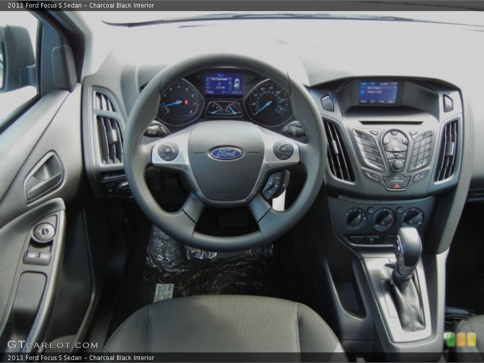 Charcoal Black Interior Dashboard for the 2013 Ford Focus S Sedan #71766207