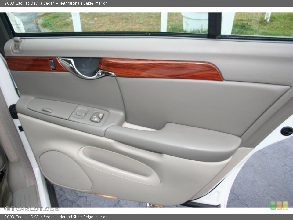 Neutral Shale Beige Interior Door Panel for the 2003 Cadillac DeVille Sedan #71771988