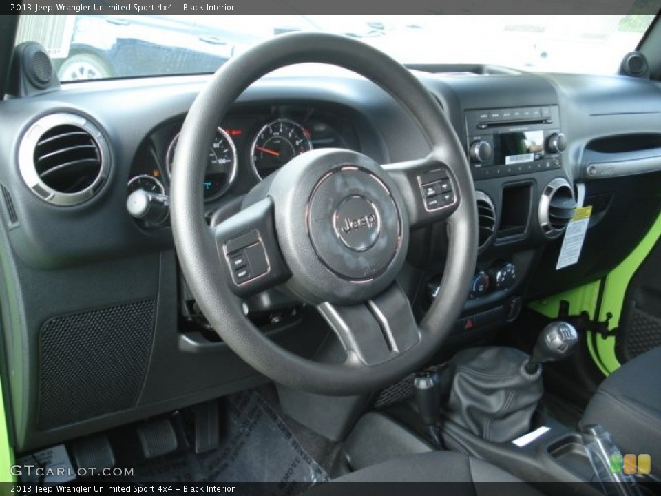 Black Interior Steering Wheel for the 2013 Jeep Wrangler Unlimited Sport 4x4 #71810472