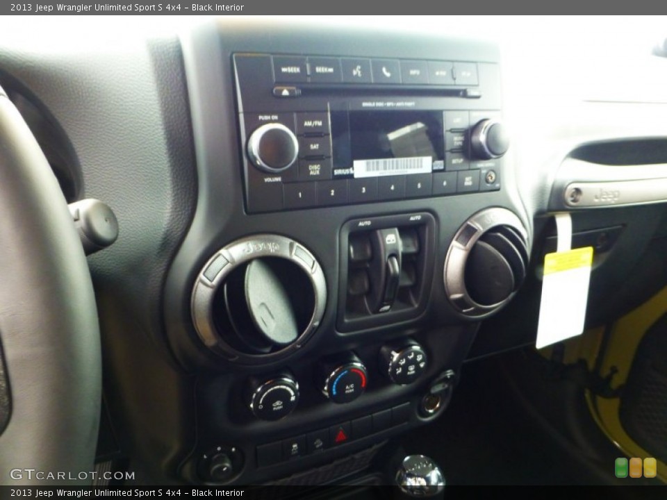 Black Interior Controls for the 2013 Jeep Wrangler Unlimited Sport S 4x4 #71834887