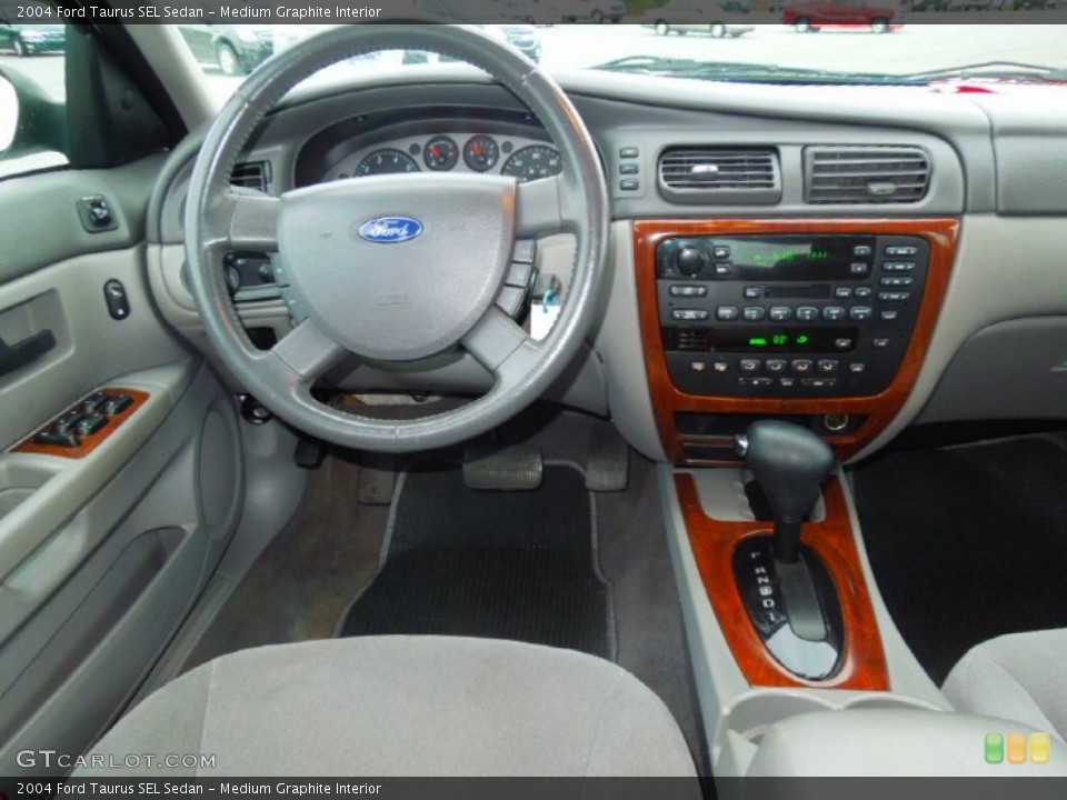 Medium Graphite Interior Dashboard for the 2004 Ford Taurus SEL Sedan #71900544