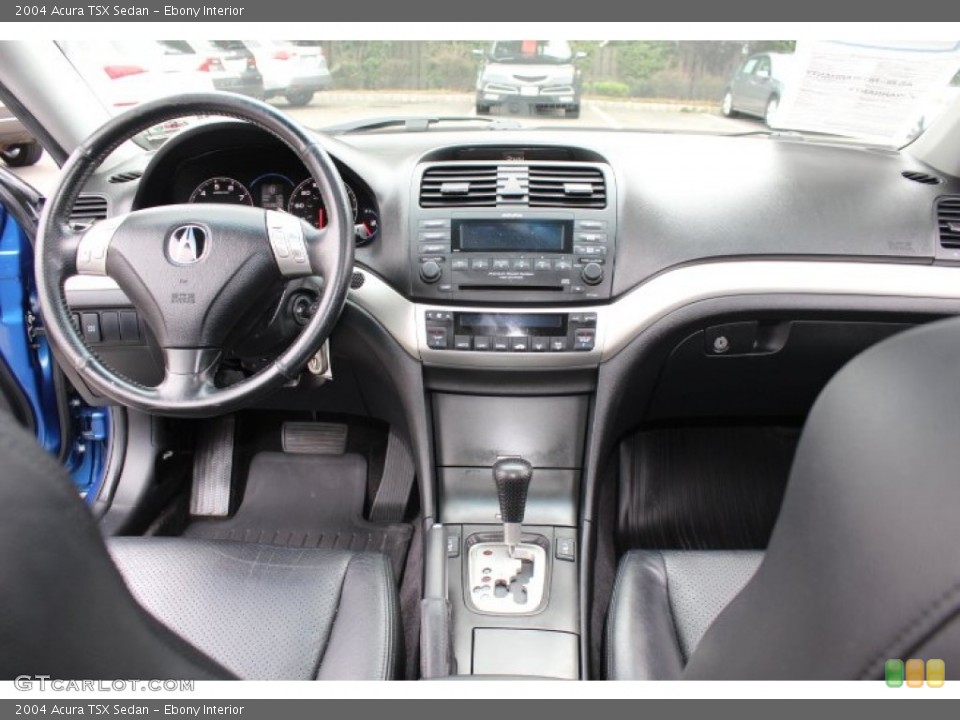 Ebony Interior Dashboard for the 2004 Acura TSX Sedan #71904137