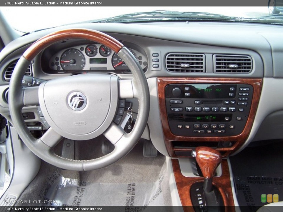 Medium Graphite Interior Dashboard for the 2005 Mercury Sable LS Sedan #71913264