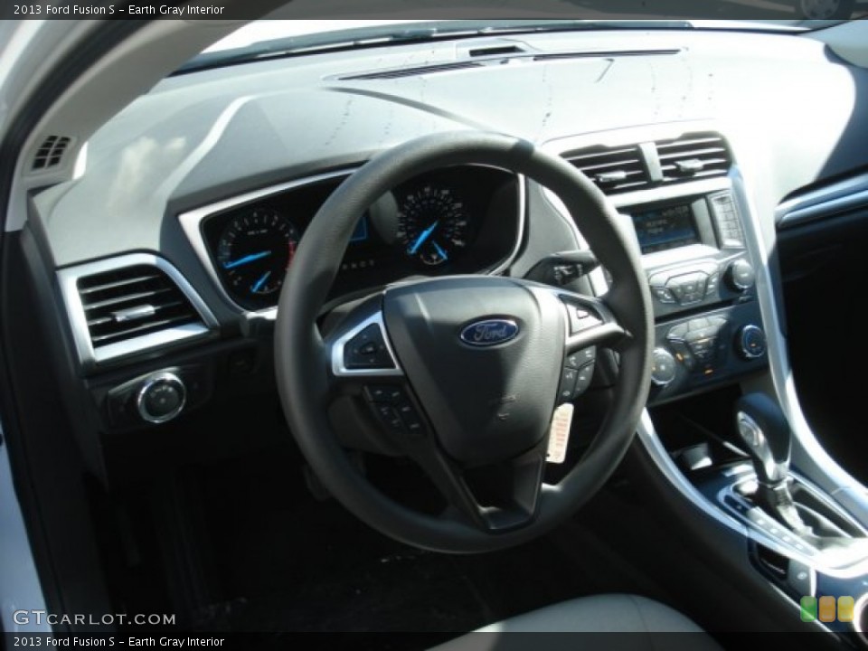 Earth Gray Interior Dashboard for the 2013 Ford Fusion S #71932134