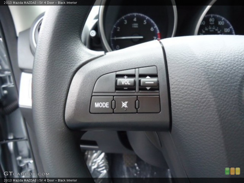 Black Interior Controls for the 2013 Mazda MAZDA3 i SV 4 Door #71940396