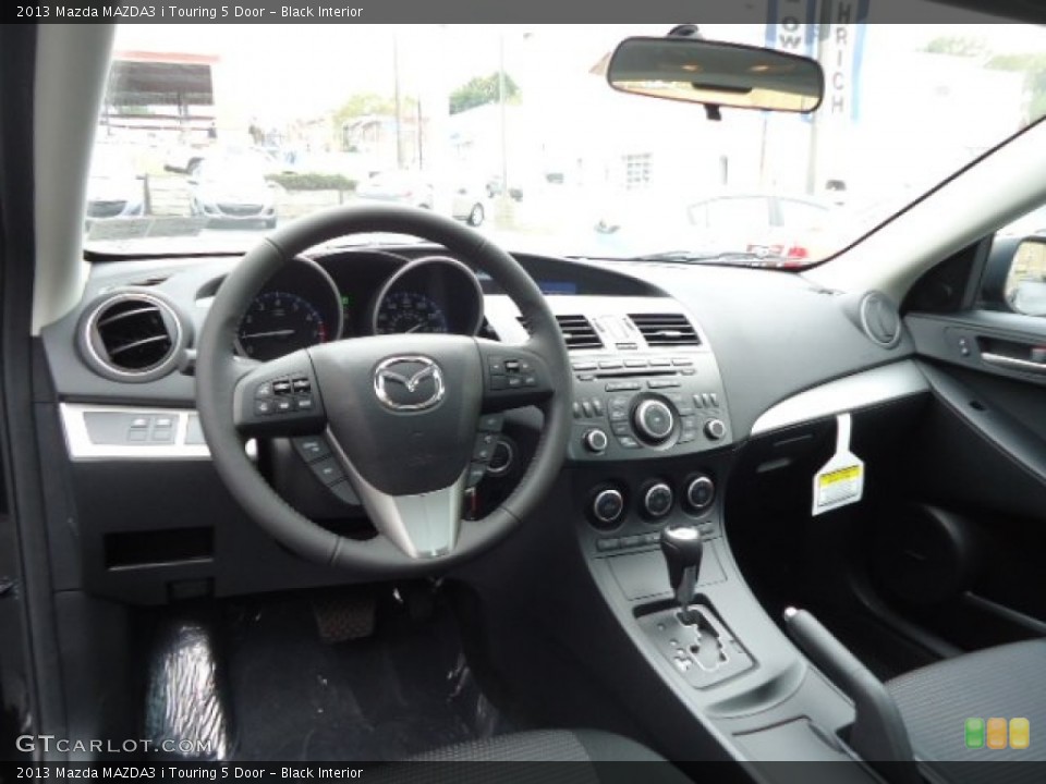 Black Interior Photo for the 2013 Mazda MAZDA3 i Touring 5 Door #71940730