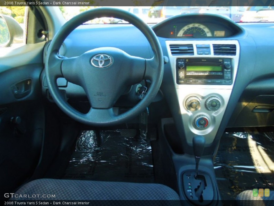 Dark Charcoal Interior Dashboard for the 2008 Toyota Yaris S Sedan #72013414