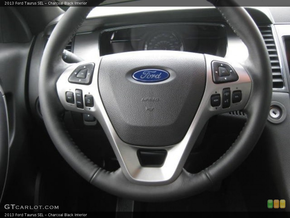Charcoal Black Interior Steering Wheel for the 2013 Ford Taurus SEL #72023988