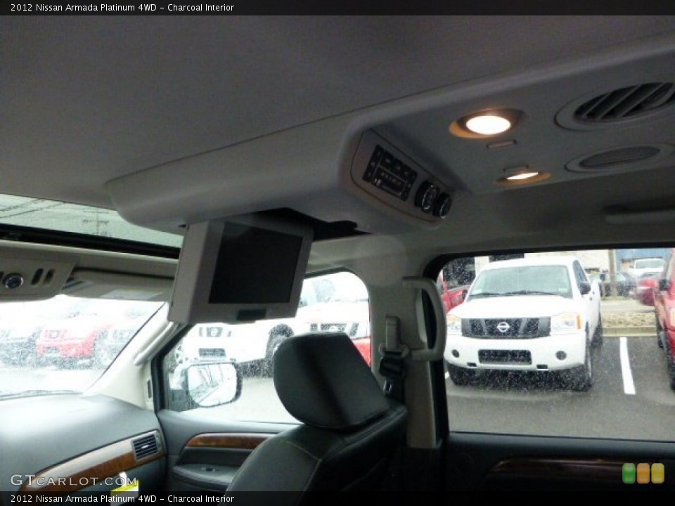 Charcoal Interior Controls for the 2012 Nissan Armada Platinum 4WD #72096760