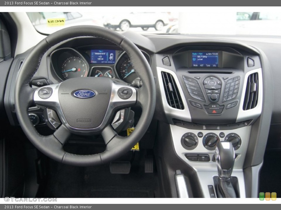 Charcoal Black Interior Dashboard for the 2013 Ford Focus SE Sedan #72103863