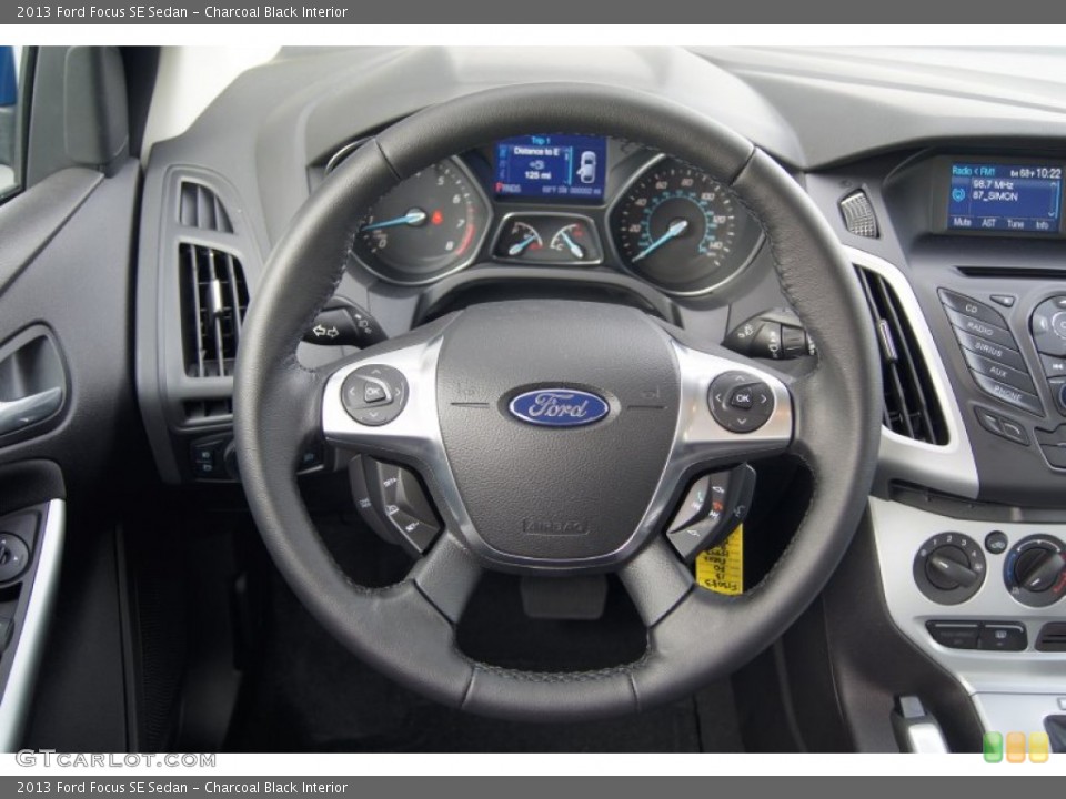 Charcoal Black Interior Steering Wheel for the 2013 Ford Focus SE Sedan #72103887