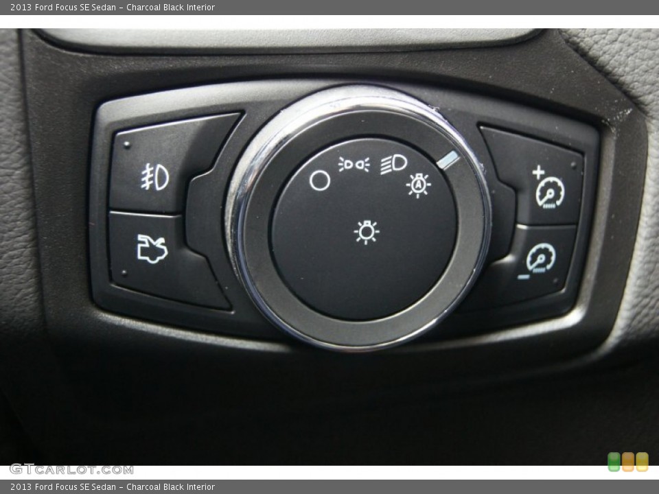 Charcoal Black Interior Controls for the 2013 Ford Focus SE Sedan #72103908