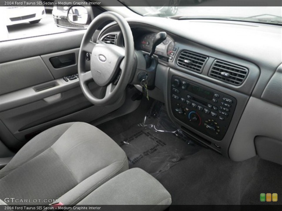 Medium Graphite Interior Dashboard for the 2004 Ford Taurus SES Sedan #72145364