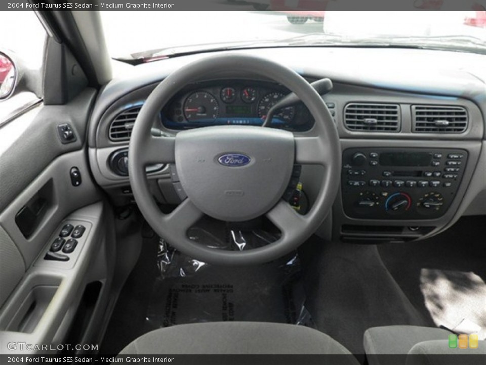 Medium Graphite Interior Dashboard for the 2004 Ford Taurus SES Sedan #72145683