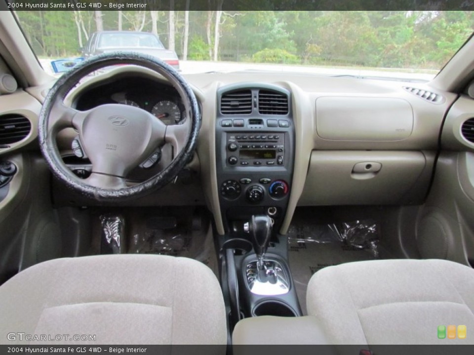Beige Interior Dashboard for the 2004 Hyundai Santa Fe GLS 4WD #72211928