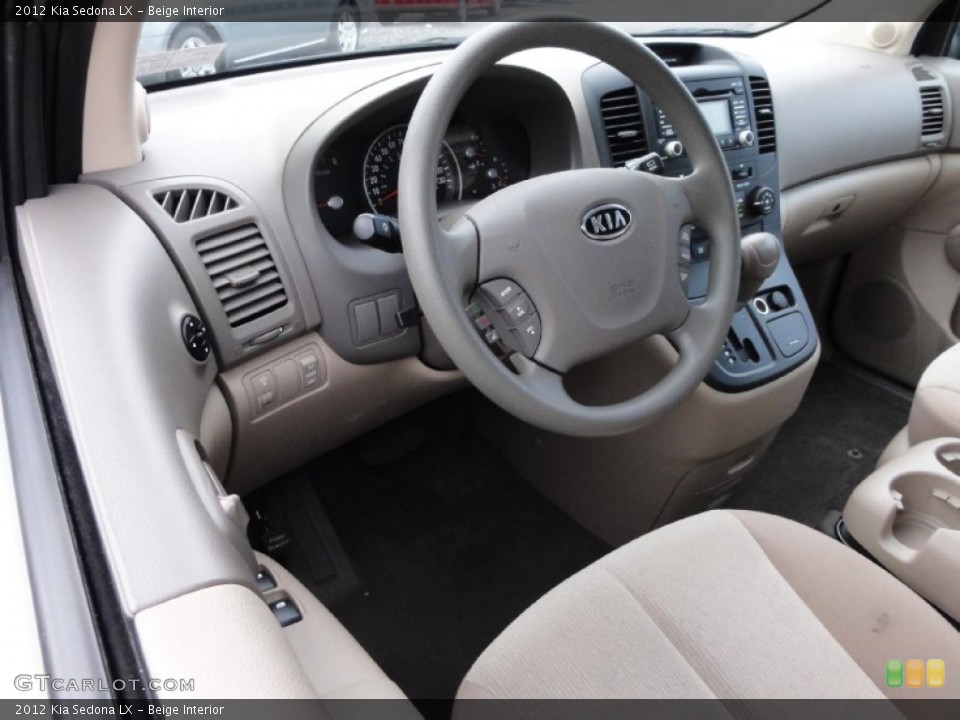 Beige Interior Dashboard for the 2012 Kia Sedona LX #72217637