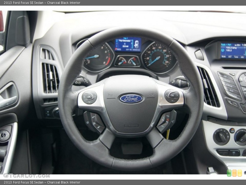 Charcoal Black Interior Steering Wheel for the 2013 Ford Focus SE Sedan #72222533