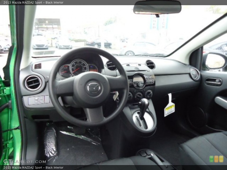 Black Interior Prime Interior for the 2013 Mazda MAZDA2 Sport #72228680