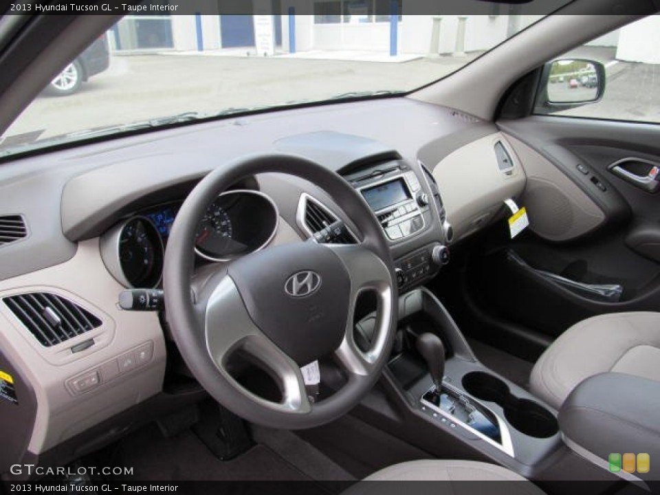 Taupe Interior Dashboard for the 2013 Hyundai Tucson GL #72230225