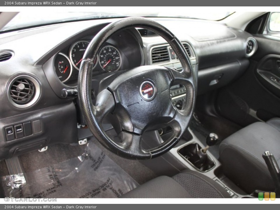 Dark Gray Interior Steering Wheel for the 2004 Subaru Impreza WRX Sedan #72233255
