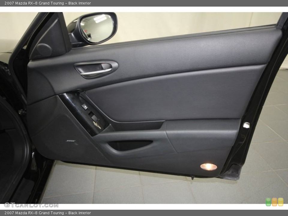 Black Interior Door Panel for the 2007 Mazda RX-8 Grand Touring #72243125