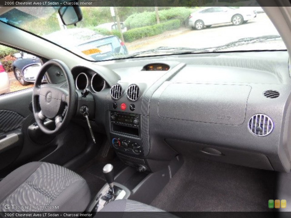 Charcoal Interior Dashboard for the 2006 Chevrolet Aveo LT Sedan #72250375
