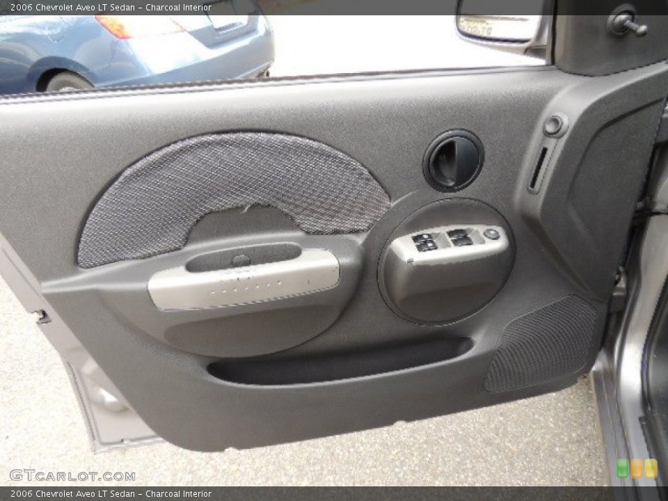 Charcoal Interior Door Panel for the 2006 Chevrolet Aveo LT Sedan #72250393
