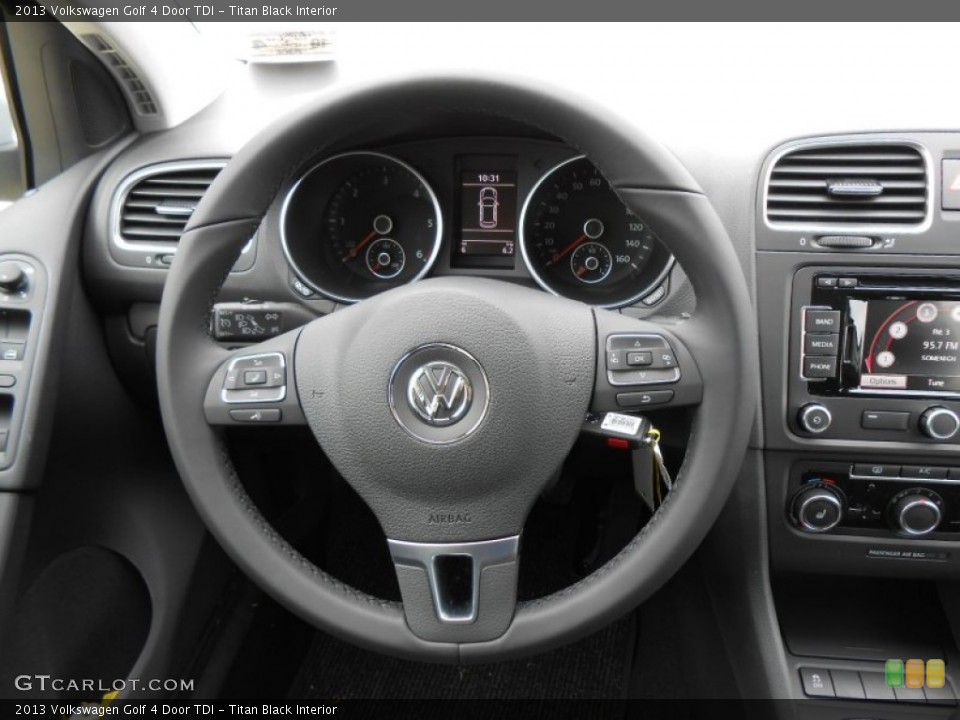 Titan Black Interior Steering Wheel for the 2013 Volkswagen Golf 4 Door TDI #72264607