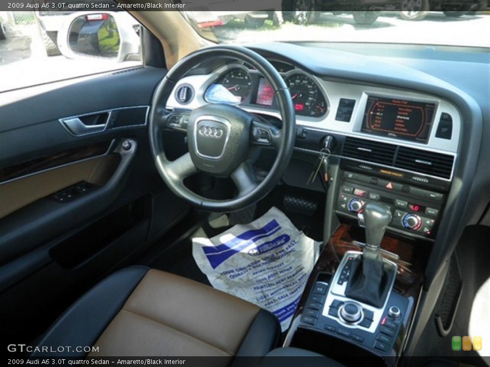 Amaretto/Black Interior Dashboard for the 2009 Audi A6 3.0T quattro Sedan #72269734