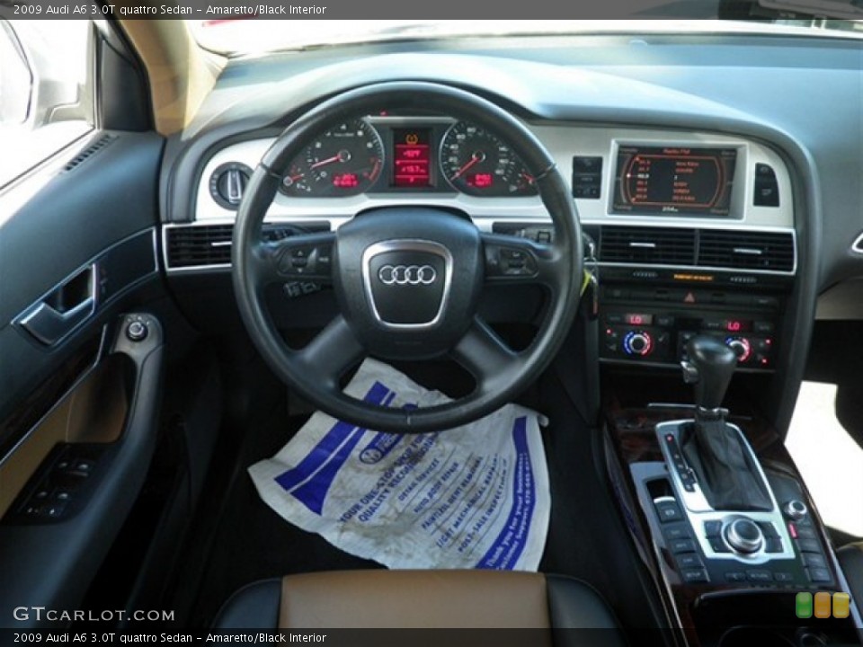 Amaretto/Black Interior Dashboard for the 2009 Audi A6 3.0T quattro Sedan #72269788