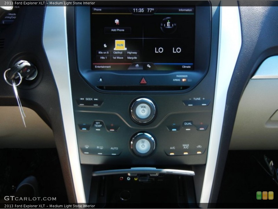 Medium Light Stone Interior Controls for the 2013 Ford Explorer XLT #72347514
