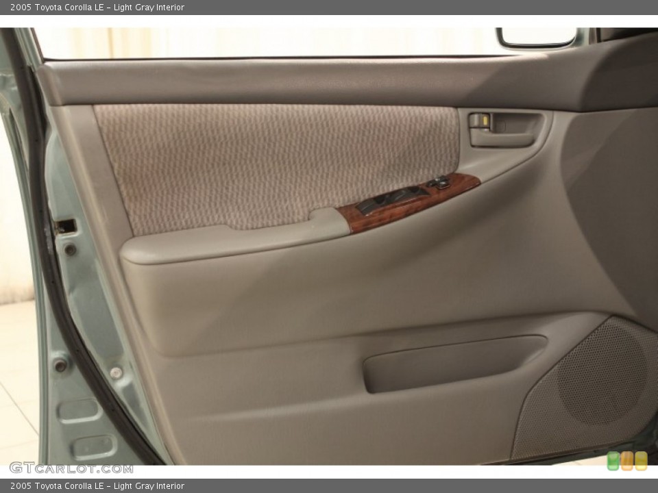 Light Gray Interior Door Panel for the 2005 Toyota Corolla LE #72353790
