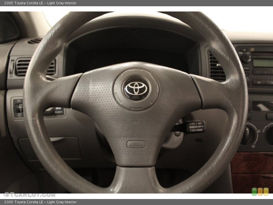 Light Gray Interior Steering Wheel for the 2005 Toyota Corolla LE #72353829