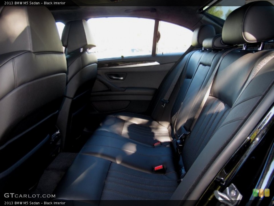 Black Interior Rear Seat for the 2013 BMW M5 Sedan #72358980
