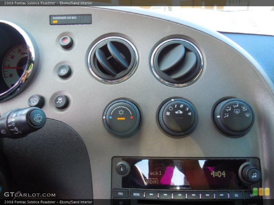 Ebony/Sand Interior Controls for the 2009 Pontiac Solstice Roadster #72404331